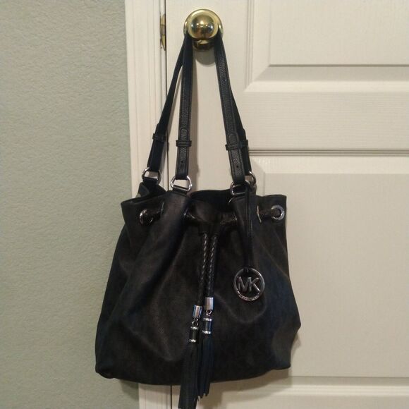 Michael Kors Signature Coated Leather Jet Set Tassel Drawstring Tote Bag Large - Picture 1 of 15
